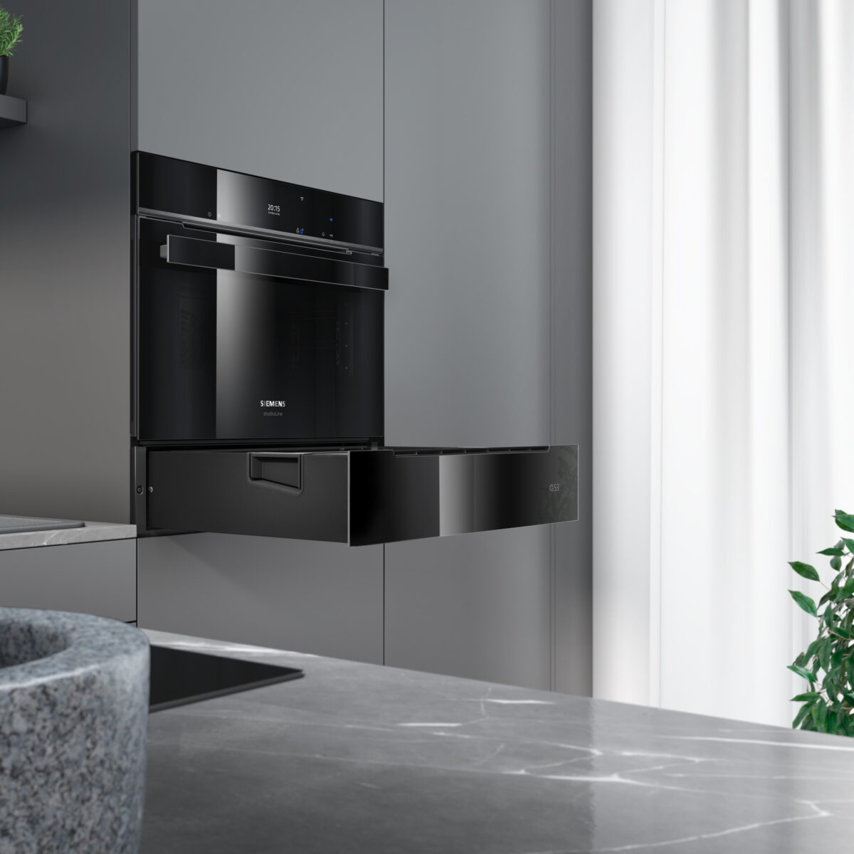 Siemens Dampfschublade seitlich eingebaut in grauen Hochschrank